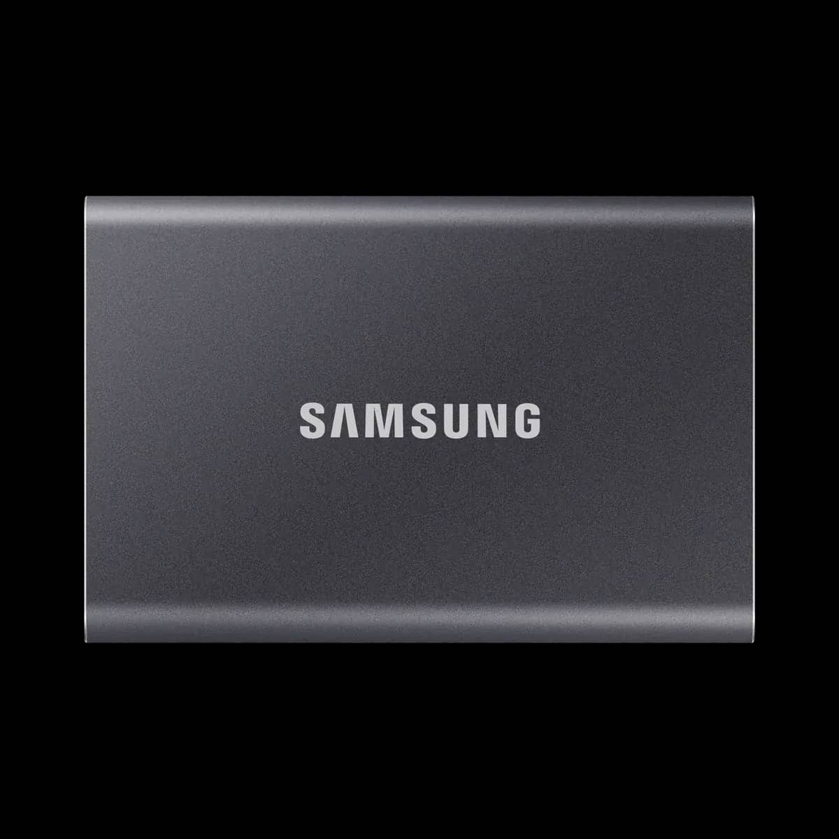A small portable solid state drive beside a USB-C cable