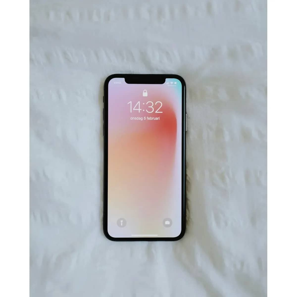 A replacement phone display panel with its ribbon cable